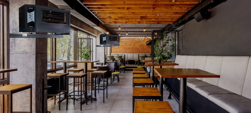 Interior of a modern industrial design pub with a rustic twist